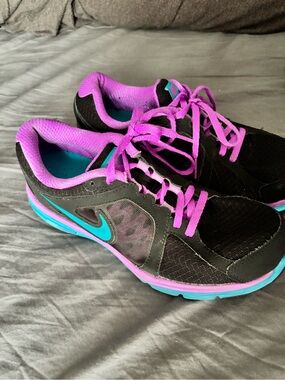 Nike Women’s Black Athletic Sneakers with Purple and Teal Accents